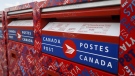 Mail boxes are seen at Canada Post's main plant in Calgary, Alta., Saturday, May 9, 2020. (THE CANADIAN PRESS/Jeff McIntosh)