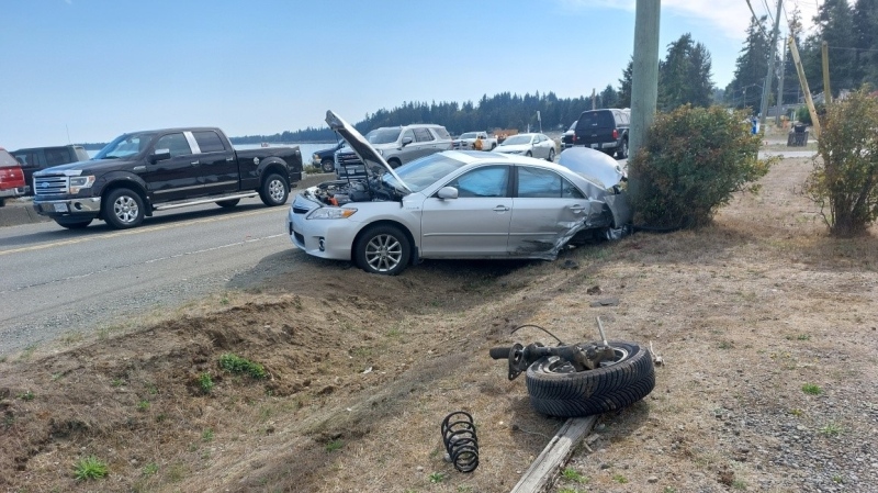 The car that struck the power pole sustained significant rear-end damage and was towed from the scene. (RCMP)