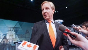 Dominic Cardy speaks to media after the New Brunswick leaders debate in Moncton on Tuesday, September 9, 2014. THE CANADIAN PRESS/Marc Grandmaison