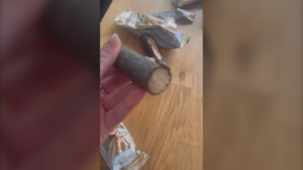 A Toronto-based actor has taken to social media after finding several pieces of wood inside wrappers for protein bars. 