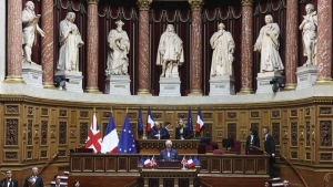 Britain's King Charles III addresses French lawmakers from both the upper and the lower house of parliament, at the French Senate Thursday, Sept. 21, 2023 in Paris. ( Emmanuel Dunand, Pool via AP)