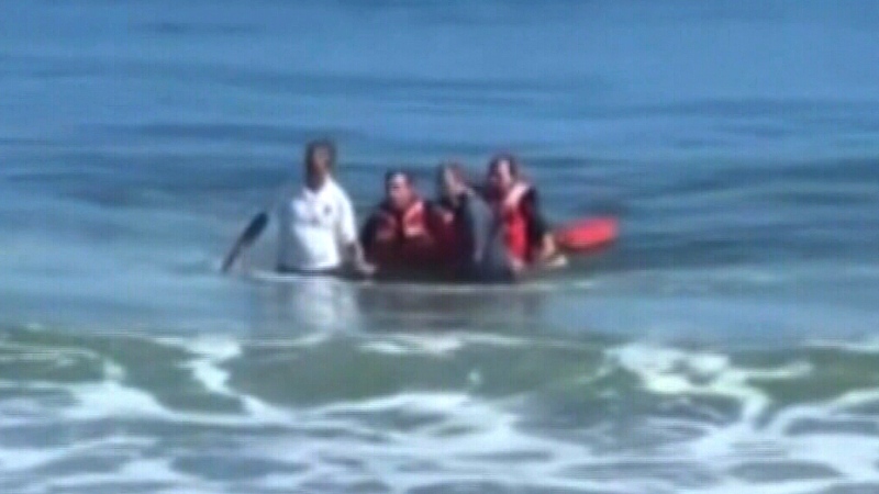 Father and son rescued from powerful rip currents