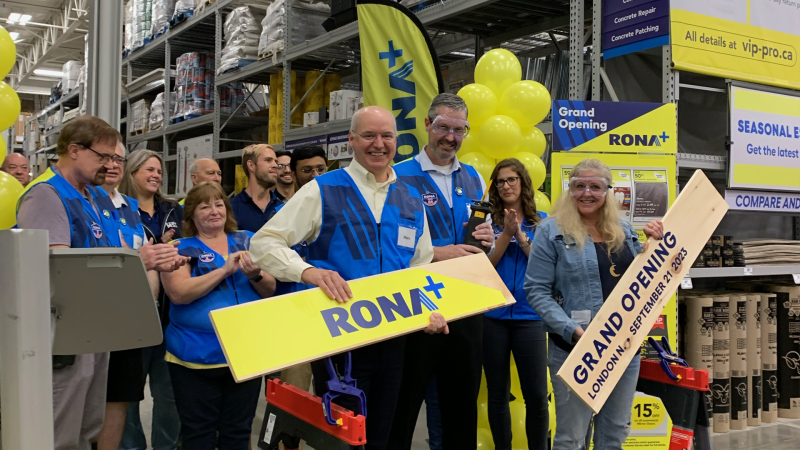 Unity Project Executive Director Chuck Lazenby (front row, right) posed with Rona staff at the grand opening of the new north London Rona Store (formerly Lowes) on Sept. 21, 2023. (Bryan Bicknell/CTV News London) 