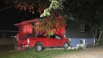 A stolen truck hit a house in south Edmonton on Sept. 21, 2023. (Evan Klippenstein/CTV News Edmonton)