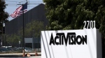 A sign outside the Activision building in Santa Monica, Calif., June 21, 2023. British competition regulators signaled Friday, Sept. 22 that Microsoft’s restructured $69 billion deal to buy video game maker Activision Blizzard is likely to receive antitrust approval by next month's deadline. (AP Photo/Richard Vogel, File)