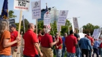United Auto Workers march outside the Stellantis North American Headquarters, Wednesday, Sept. 20, 2023, in Auburn Hills, Mich. (AP Photo/Carlos Osorio)