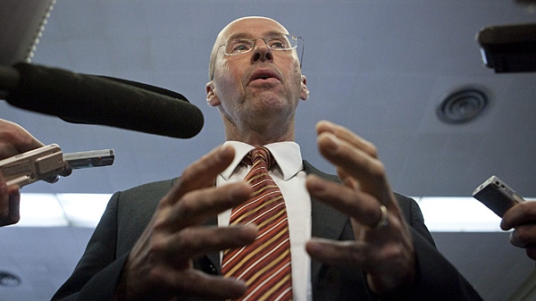 Parliamentary Budget Officer, Kevin Page gestures while answering questions from the media following a technical briefing on Parliament Hill in Ottawa on Thursday, Feb. 18, 2010. (Pawel Dwulit / THE CANADIAN PRESS)