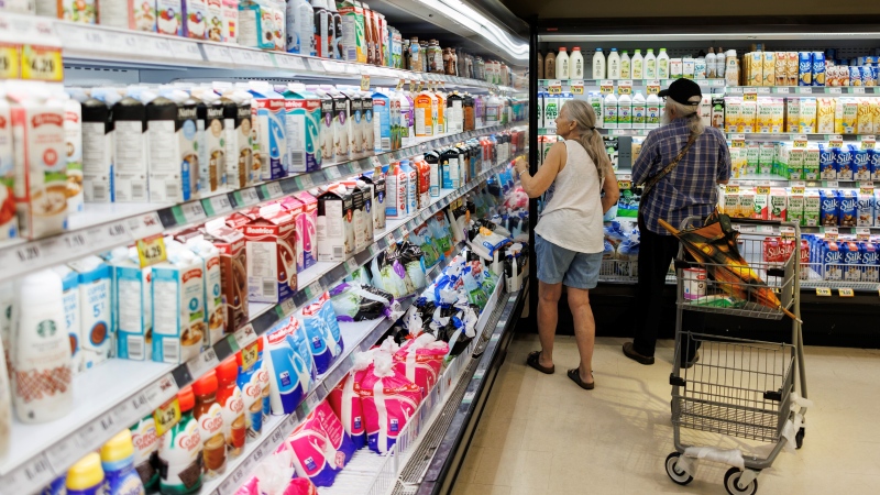 People shop inside a Metro grocery store in Toronto, Tuesday, July 18, 2023. THE CANADIAN PRESS/Cole Burston