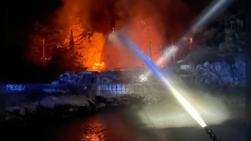 This photo shared by Vancouver Fire Rescue Service Chief Karen Fry shows crews fighting a blaze in Horseshoe Bay. 