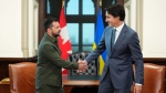 Prime Minister Justin Trudeau shakes hands with Ukrainian President Volodymyr Zelenskyy on Parliament Hill in Ottawa on Friday, Sept. 22, 2023. THE CANADIAN PRESS/Sean Kilpatrick