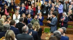Ukrainian President Volodymyr Zelenskyy receives a standing ovation from Prime Minister Justin Trudeau and parliamentarians as he arrives to deliver a speech in the House of Commons in Ottawa on Friday, Sept. 22, 2023. THE CANADIAN PRESS/Sean Kilpatrick