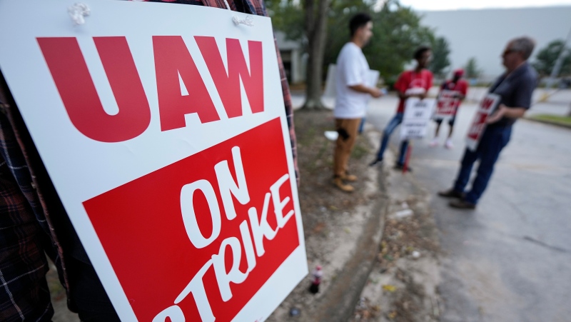 United Auto Workers of local 868 demonstrate outside a Stellantis parts-distribution centre, Friday, Sept. 22, 2023, in Morrow, Ga. (AP Photo/Mike Stewart)