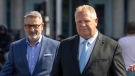 Ontario Premier Doug Ford and other Progressive Conservative Party of Ontario members arrive at press conference in Niagara Falls, Ont., Thursday, Sept. 21, 2023 where he announced that he will be reversing his government’s decision to open the Greenbelt to developers. The announcement comes after a second cabinet minister resigned in the wake of the Greenbelt controversy. THE CANADIAN PRESS/Tara Walton