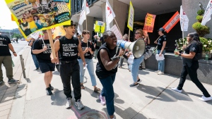TVO employees and supports are seen on the picket line outside of TVO offices Toronto, Monday, Aug. 21, 2023. Dozens of workers at TVO are walking off the job, saying they haven't been able to reach a reasonable agreement with their employer. (THE CANADIAN PRESS/Spencer Colby)