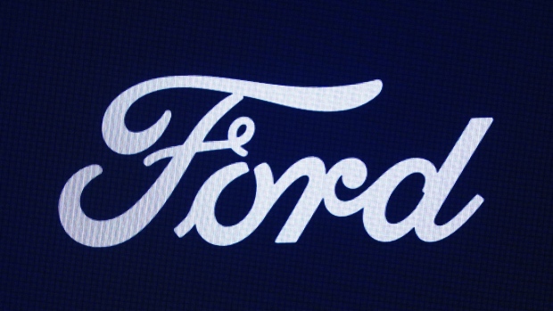 A Ford logo is shown at the North American International Auto Show in Detroit, Sept. 13, 2023. THE CANADIAN PRESS/AP/Paul Sancya
