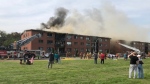 A four-alarm fire burned at a Dorval apartment building on Sept. 23, 2023. (CTV News) 
