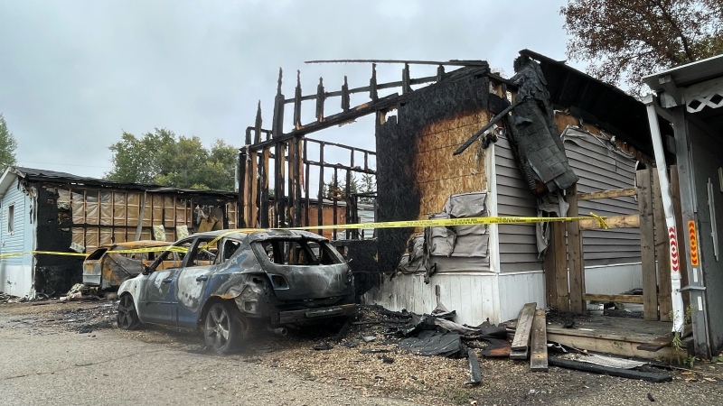 An overnight fire in Moose Jaw engulfed surrounding vehicles and homes. (Mick Favel / CTV News) 