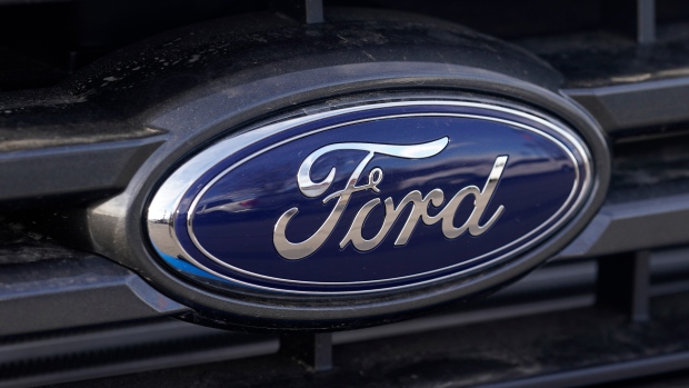 In this Sunday, April 25, 2021, photograph, the blue oval logo of Ford Motor Company is shown at a dealership in east Denver. Ford is recalling more than 650,000 pickup trucks and big SUVs in the U.S., Thursday, April 21, 2022, because the windshield wipers can break and fail. The recall covers certain F-150 pickups, and Ford Expedition and Lincoln Navigator SUVs from the 2020 and 2021 model years. (AP Photo/David Zalubowski, File)