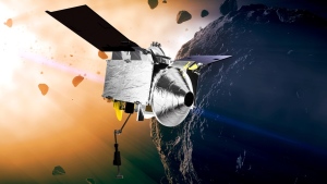 This illustration provided by NASA depicts the OSIRIS-REx spacecraft at the asteroid Bennu. On Sept. 24, 2023, the spacecraft will fly by Earth and drop off what is expected to be at least a cupful of rubble it grabbed from the asteroid Bennu, closing out a seven-year quest. (Conceptual Image Lab/Goddard Space Flight Center/NASA via AP, File)