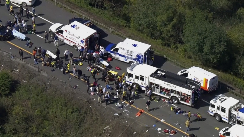 Emergency responders work the scene of a bus crash, in Wawayanda, N.Y., Thursday, Sept. 21, 2023. (NBC New York via AP)