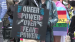 Rainbow flags, colourful outfits, and creative signs of support for the LGBTQ2S+ community could be seen throughout the crowd gathered at the legislative grounds Sunday morning. (Source: Zach Kitchen, CTV News.)