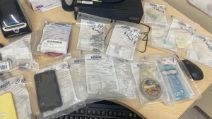 Ontario Provincial Police shared a photo of a large amount of suspected fentanyl and other drug paraphernalia seized during the arrest of a Chapleau woman last month on social media. (Supplied)