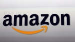 The Amazon logo is seen, Sept. 6, 2012, in Santa Monica, Calif. On Wednesday, Sept. 20, 2023, Amazon unveiled a slew of gadgets and an update to its popular voice assistant Alexa, infusing it with more generative AI features to better compete with other tech companies who've rolled out flashy chatbots. (AP Photo/Reed Saxon, File)