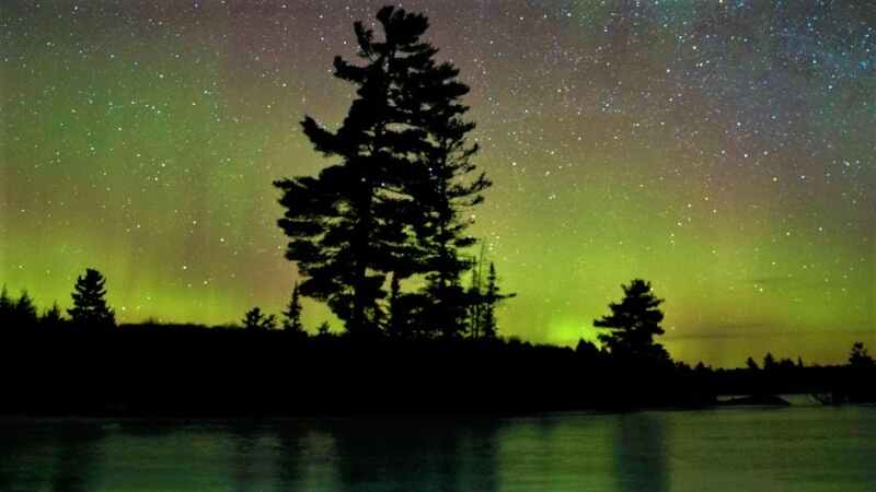 The aurora borealis, or northern lights, make a rare appearance over central Ontario north of Hwy 36 in Kawartha Lakes, Ont., on Sunday, March 21, 2021. THE CANADIAN PRESS/Fred Thornhill