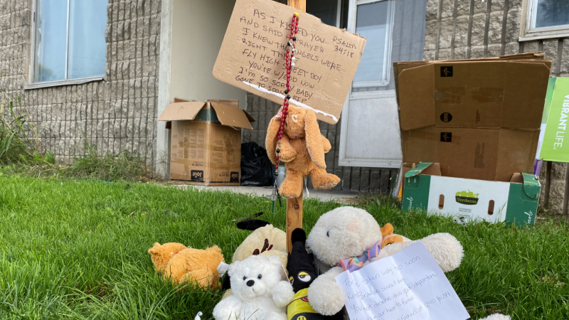 A small memorial sits outside a Donald Street apartment building where a 3-year-old boy fell to his death. Sept. 25, 2023. (Leah Larocque/CTV News Ottawa)