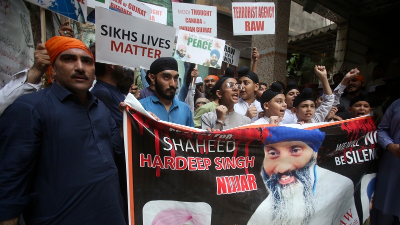 Members of Sikh community hold a protest against the killing of Hardeep Singh Nijjar, in Peshawar, Pakistan, Wednesday, Sept. 20, 2023. Dozens of Sikhs living in Pakistan rallied against the killing of Nijjar, a 45-year-old Sikh leader who was killed by masked gunmen in Canada in June. The demonstrators alleged that New Delhi was behind the man's assassination. (AP Photo/Muhammad Sajjad)