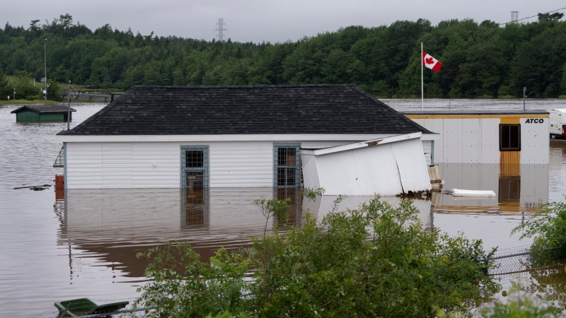 Buildings are seen in floodwater following a major rain event in Halifax on Saturday, July 22, 2023.THE CANADIAN PRESS/Darren Calabrese
