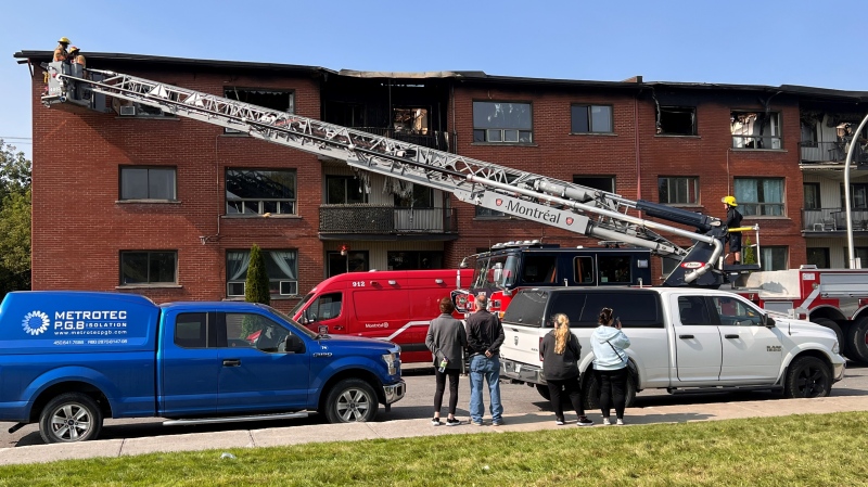 Residents look at the damage from a fire that forced them from their homes on Saturday, Sept. 23, 2023. (Amanda Kline/CTV News)