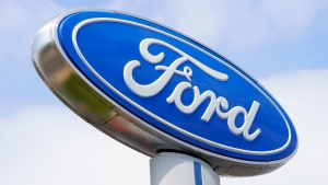 A Ford sign is shown at a dealership in Springfield, Pa., April 26, 2022. (AP Photo/Matt Rourke)