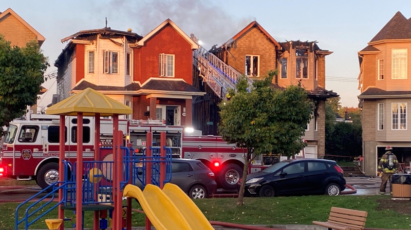 Four residences were damaged, and four families relocated after a fire broke out in Laval on Sept. 26, 2023. (Kelly Greig/CTV News)
