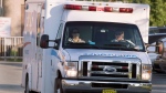 Paramedics are seen at the Dartmouth General Hospital in Dartmouth, N.S. on Thursday, July 4, 2013. (THE CANADIAN PRESS/Andrew Vaughan)