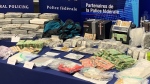 Seized drugs, cash and other items are seen in a picture taken Sept. 26, 2023. (CTV Atlantic)