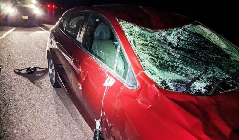Schreiber OPP posted social media photos of the car, which is badly dented and had its windshield caved in. The collision happened near Pays Plat First Nation. (Photos courtesy of Schreiber OPP)