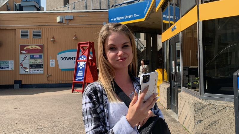 Ferry commuter Kelsie McKay is pictured in front of the the Halifax Ferry Terminal.