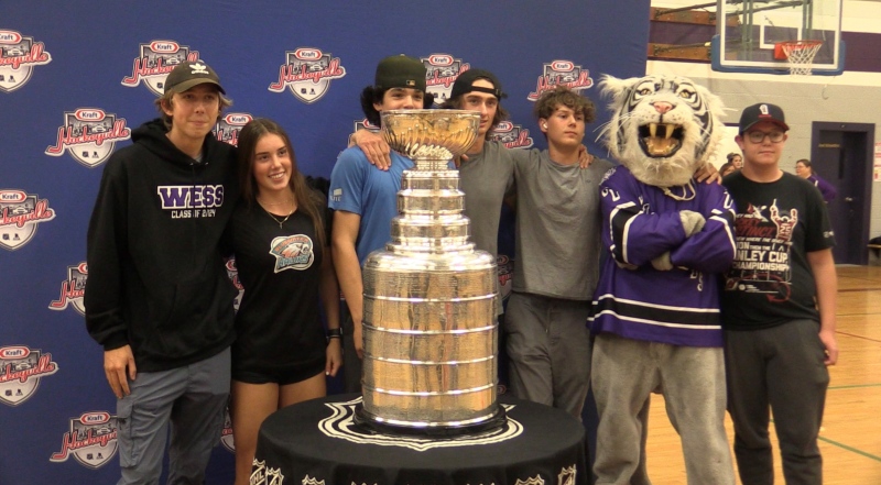 West Elgin Secondary School students pose with the Stanley Cup during the Kraft Hockeyville celebration in West Lorne, Ont. (Source: Brent Lale/CTV London)