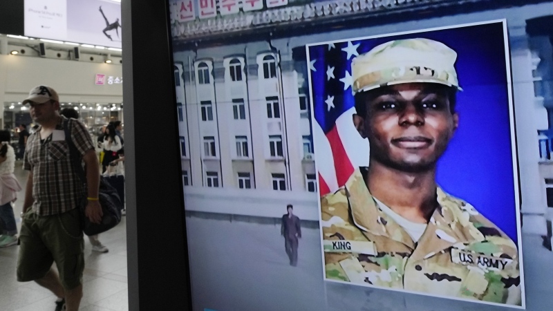 A TV screen shows a file image of American soldier Travis King during a news program at the Seoul Railway Station in Seoul, South Korea, Wednesday, Aug. 16, 2023. (AP Photo/Ahn Young-joon)