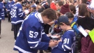 Toronto Maple Leafs rookie Easton Cowan of Mt. Brydges, Ont. signs an autograph for a fan in St. Thomas, Ont. as part of the Kraft Hockeyville game on Wednesday, Sept. 27, 2023. (Brent Lale/CTV News London)