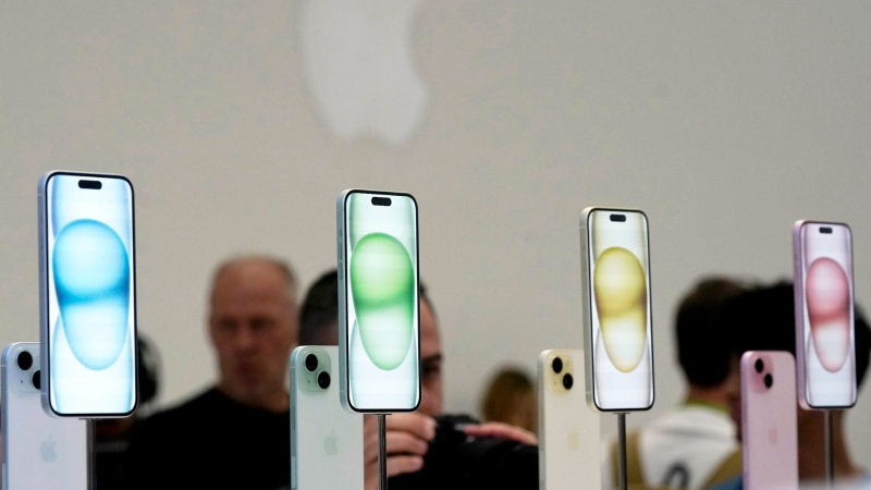 The iPhone 15 phones are shown during an announcement of new products on the Apple campus in Cupertino, Calif., Sept. 12, 2023. (AP Photo/Jeff Chiu, File)