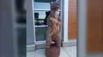 The wooden bear statue that normally greets visitors at a Kelowna restaurant is pictured in a handout image from Kelowna RCMP. 
