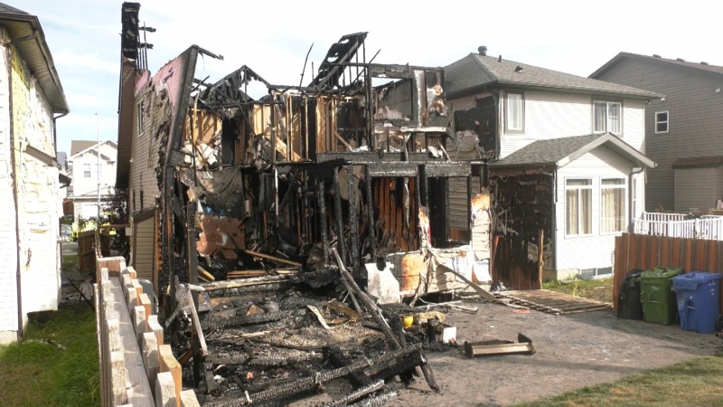 An overnight fire in northeast Calgary destroyed one home and damaged two others. The blaze also displaced more than a dozen residents.