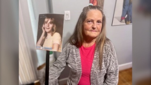 Tammy Dennett with a picture of her later sister Donna Jean Awcock, who was murdered on October 13, 1983. (Sean Irvine/CTV News London)