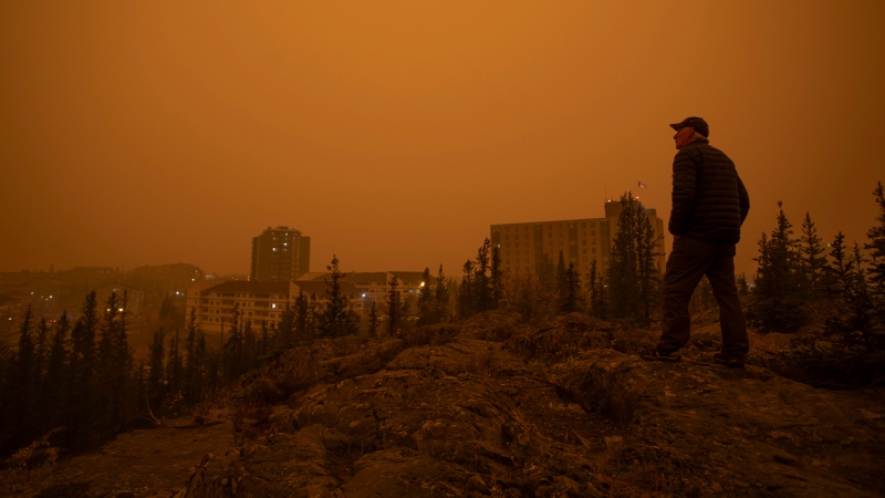 Heavy smoke from wildfires in northern Alberta and British Columbia fill the air at 9am Mountain Daylight Time in Yellowknife, Northwest Territories on Saturday, Sept. 23, 2023. THE CANADIAN PRESS/Bill Braden