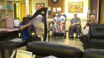 Cheryl Delmar, a certified therapeutic harp practitioner through the International Harp Therapy program, plays for long-term care residents at Foyer Lacombe in St. Albert on Sept. 23, 2023. (CTV News Edmonton / John Hanson)