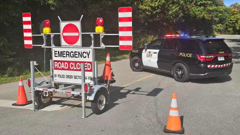 An Ontario Provincial Police cruiser blocks a road closed for a police investigation. (Source: OPP)