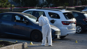 Two vehicles appear to have significant damage after police say an IED detonated in an Anne Street parking lot in Barrie, Ont., on Wed., Sept. 28, 2023. (Courtesy: Michael Chorney/At The Scene Photography)