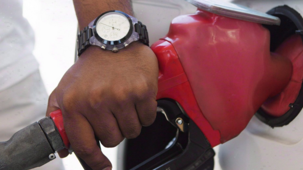 A man is shown pumping gas as prices are expected to fall this weekend. Fri., Sept. 29, 2023 (CANADIAN PRESS)